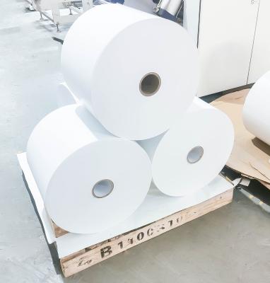 China Pegamento de fusión en caliente Autoadhesivo Rollo de papel sintético 75u espesor de superficie inyección de tinta mate en venta