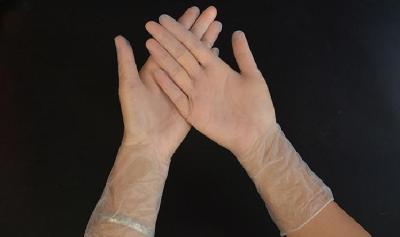 中国 8g/Pc使い捨て可能なビニールの手袋の病院300MMの医学のビニールの検査の手袋 販売のため