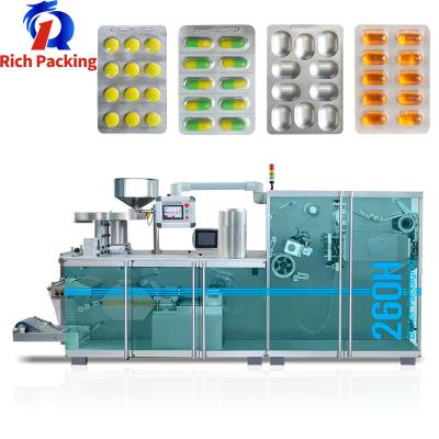 China Pharmaceutical Roller Type Capsule Tablet Pill Alu Pvc Alu Alu Blister Packing Packaging Machine for sale