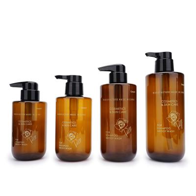 China Round Amber Plastic Shampoo Bottles 500ml 600ml With Pump for sale