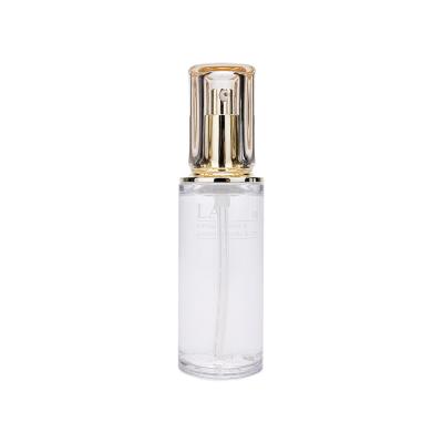 China Cosmetic PET Plastic Lotion Bottle High Transparency Golden Pump Bottle 60ml for sale