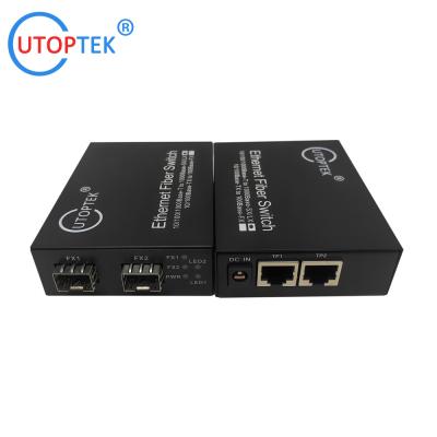 China universal Mini Switch 2*10/100/1000Base-Tx to 2*1000Base-Fx SFP Fiber ethernet switch,network switch,media converter for sale