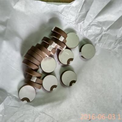 China Curling Edge Piezoelectric Ceramic Discs Ceramic Round Plate Positive And Negative Poles for sale