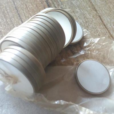 中国 白い色でカスタマイズされる円形の圧電気の陶磁器材料の耐熱性 販売のため