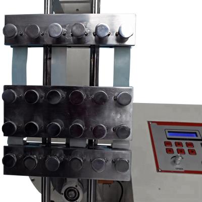China ASTM D813 Tensile Testing Equipment At 300±10 Times/min For Rubber And Rubber Like Materials for sale