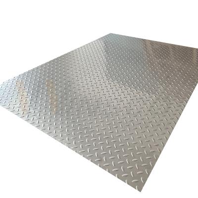 China 20mm-1250mm Embossed Stainless Steel Sheet 2b Surface Rice Grain Shape Anti Slip Plate for sale