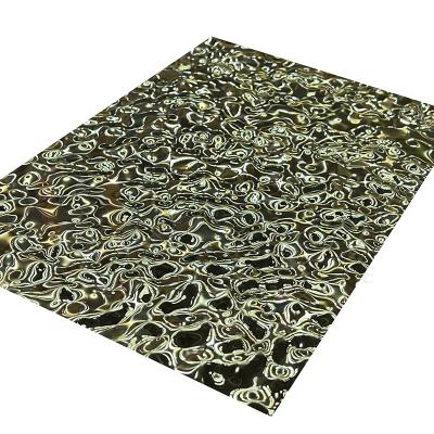 China Middle Size Embossed Stainless Steel Sheet Water Ripple 8K Titanium Gold Mirrored for sale