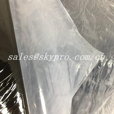 China El rollo claro transparente suave de la hoja de la goma de silicona, FDA cortó el rollo del silicón con tintas en venta