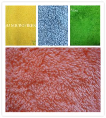 China La tela 100% de la microfibra del poliéster el 165cm 340gsm cubrió el paño grueso y suave del coral de la microfibra en venta