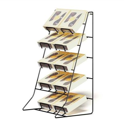 China Countertop 5 Tier Metal Wire Snake Rack Chocolate Display Stand for sale