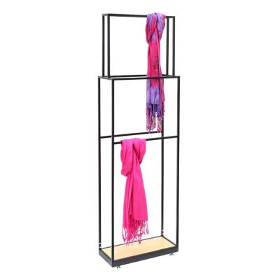 China Customized Floor Standing Matte Black Metal Scarf Display Stand for sale