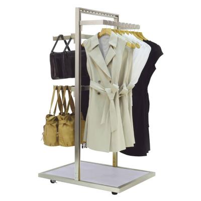 China Multiduty Double Sided Adjustable Shelves Hanging Handbag And Clothing Display Rack for sale