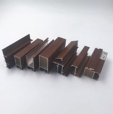 中国 0.15mm T5 Temper Wood Finish Aluminium Profiles For Bolivia Series L20 L25 L32 L5000 販売のため