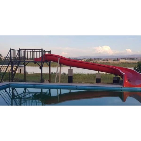 Quality Weather Resistance Fiberglass Backyard Water Slide For Kids With Stairs for sale