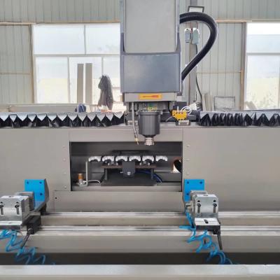 China 3000mm /3200mm Auto Tool Change CNC Drilling Machining Center CNC Copy Router Aluminum Window Door Making Machine for sale