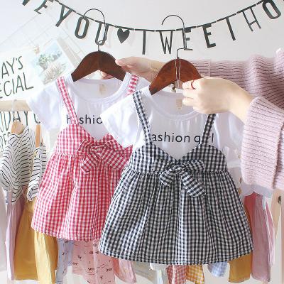 China Black White Plaid Children'S Dress Clothing Round Neck Short Sleeve Dress With Bowknot for sale
