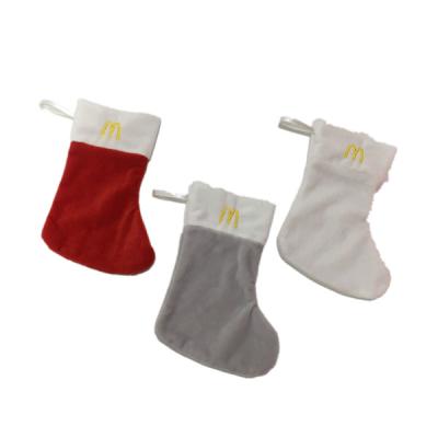 China el tejido en cable suave del 18cm los 7.09in McDonald's personalizó al OEM de las medias de la Navidad del encaje de aguja en venta