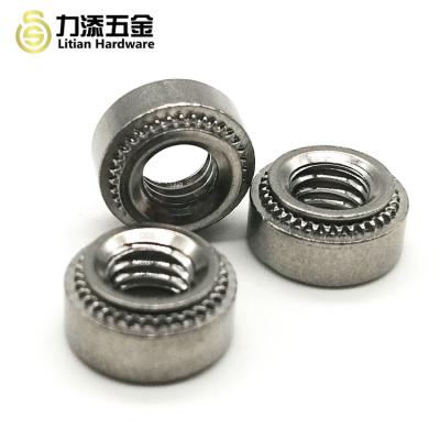 中国 ステンレス鋼/炭素鋼の円形のrivnutの自己締めつける挿入物のnutsertの出版物のリベットのナット 販売のため