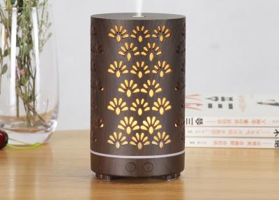 China 200ml Essential Oil Ultrasonic Home Aroma Diffuser Hollow Wood Grain Humidifier 7 LED Lights for sale