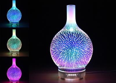 China máquina ultrasónica del Aromatherapy de los fuegos artificiales 5V del vidrio de la luz de la noche del Aromatherapy del multicolor 3D en venta