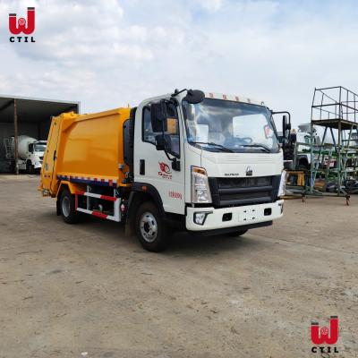 China Yellow 4X2 Compactor Garbage Truck 12m3 Refuse Compactor Vehicle for sale