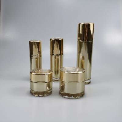 China 30ml 50ml 110ml Cylinder Acrylic Gold Emulsion Bottle with Pump Sprayer Sealing Type for sale