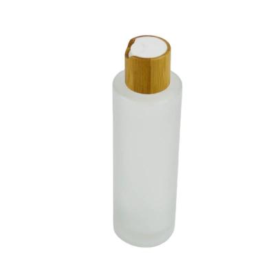 Chine Collier en verre glacé 100 ml, sérum tonifiant pour la peau, bouteille de lotion avec bouchon de disque en bambou à vendre