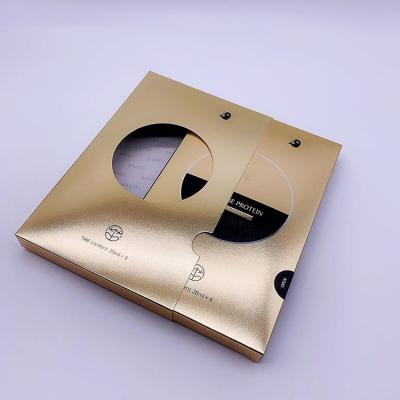 China Facial Mask Cosmetic Packaging Box Hallow out Custom Makeup Packaging Box for sale