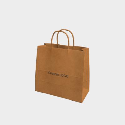 China Custom Recyclable Paper Gift Bags Brown Kraft Paper Bags With Die Cut Handle for sale