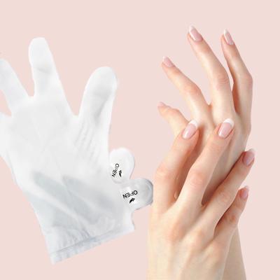 China Moist Exfoliating Hand Mask Anti Wrinkle Spa Gloves For Dry Hands for sale