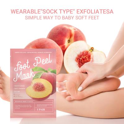 China De Diepe Bevochtigende Exfoliating Sokken van Juice Peach Foot Peel Mask Te koop