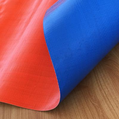 China La prenda impermeable resistente PE laminó la lona en color azul y anaranjado en venta