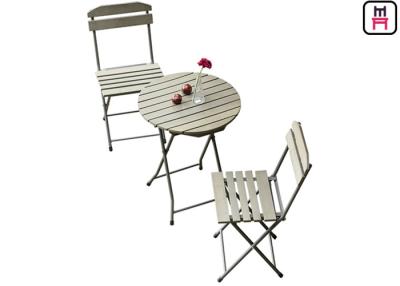 China Plastic Wood Folding Patio Dining Table And Chairs , All Weather Garden Furniture for sale