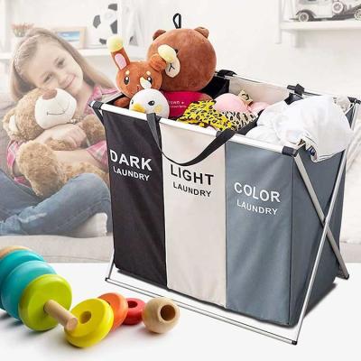 China Three Bin Sortable Collapsible Laundry Hamper With Oxford Cloth Durable Eco Friendly for sale