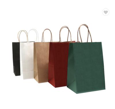 China Biodegradable Brown Kraft Paper Carrier Bags With Handles For Shopping for sale