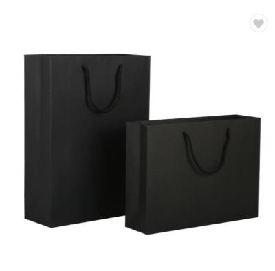 China ODM Matte Lamination Paper Bag Packaging Custom Logo Black Shopping Bag for sale