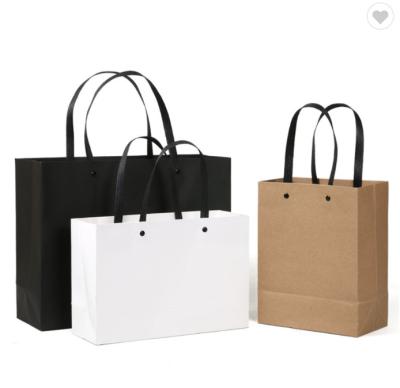 China Personalised Kraft Merchandise Bags Brown Shopping Bags Black Logo Printed for sale