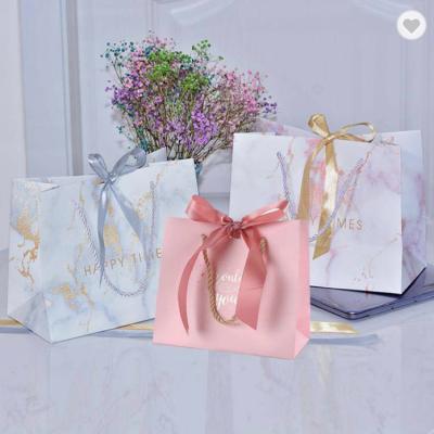 China CMYK Small Wedding Ribbon Handle Gift Bags Thank You Paper Bag 300gsm for sale