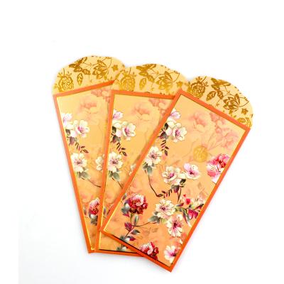 China 150gsm Money Gift Envelopes Yellow Fancy Paper Color Printing Ang Bao Envelop for sale