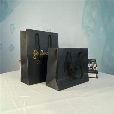 China Black Logo Custom Printed Paper Bags For Shopping for sale