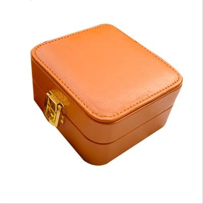 China OEM Small Portable Jewelry Box With Lock PU Leather 10cm 5cm for sale