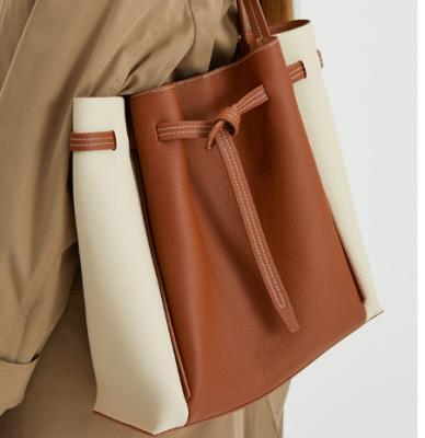 China 30cm 8cm Ladies Shoulder Bag BSCI Woven Leather Shoulder Bag for sale
