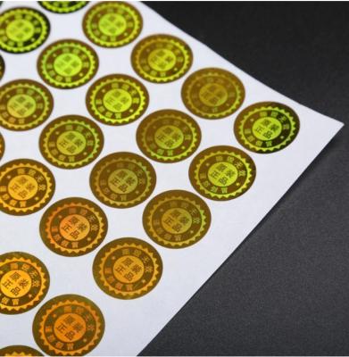 China Selbstklebende Versandetiketten aus holografischer Folie, wasserdichte Rollenetikettenaufkleber zu verkaufen