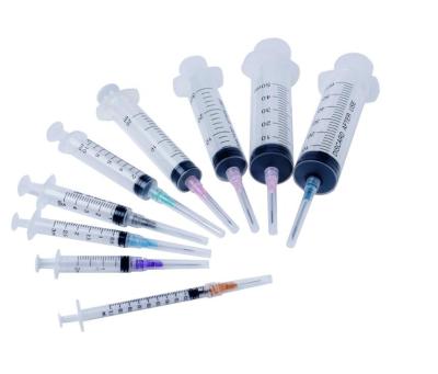 China OEM Disposable Medical Syringe Plastic Luer Lock Syringe With Needle for sale