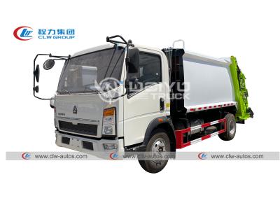 중국 HOWO 쿠민스 디젤 엔진 소모 압축 트럭 8m3 본인 로딩 언로딩 판매용