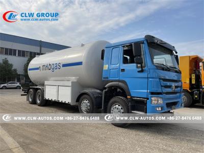 中国 流れメートルが付いているSinotruk Howo 8x4 35.5cbm LPGの配達用トラック 販売のため