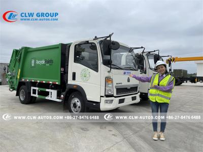 China Camión de basura del compresor de Howo 4x2 120HP 6cbm para los servicios del saneamiento en venta
