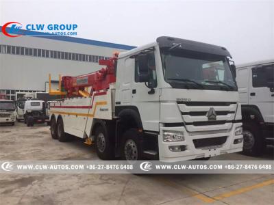 China SINOTRUK HOWO 8X4 360 Degree Rotation Heavy Duty Tow Truck for sale