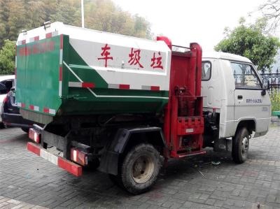 China Small Side Loading Barrel Lifting Waste Removal Trucks For Old Street Garbage Collection for sale