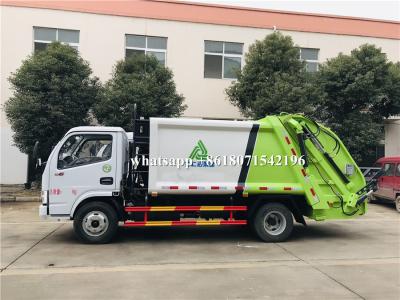 中国 3トンの印刷される油圧屑コンパクターのトラック、後部積込み機のごみ収集車のロゴ 販売のため